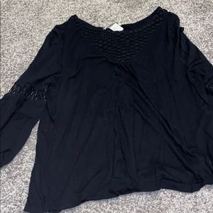 H&M black blouse with lace on arms and chest